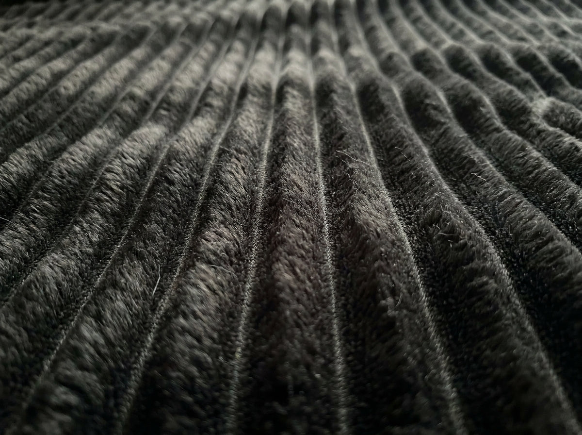 Faux Fur Throw Blanket, Channel-Quilted Ribbed Plush Blanket for Sofa, Bed & Couch, Large Cozy Home Décor, Charcoal Black