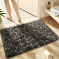 Pebble-textured memory foam bath mat
